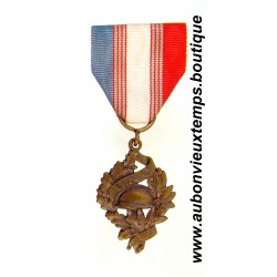 MEDAILLE Bronze de l' UNION NATIONALE des COMBATTANTS ( U.N.C.) 