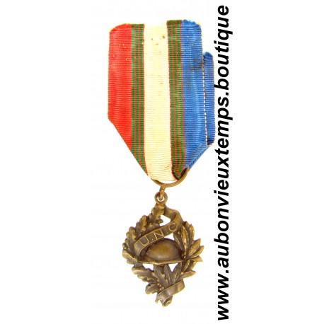 MEDAILLE Bronze de l' UNION NATIONALE des COMBATTANTS ( U.N.C.) 